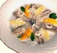 Alici delicate con contorno di arance