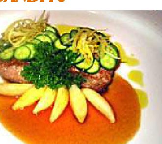 Medaglione di vitello alle zucchine con julienne di limone candito